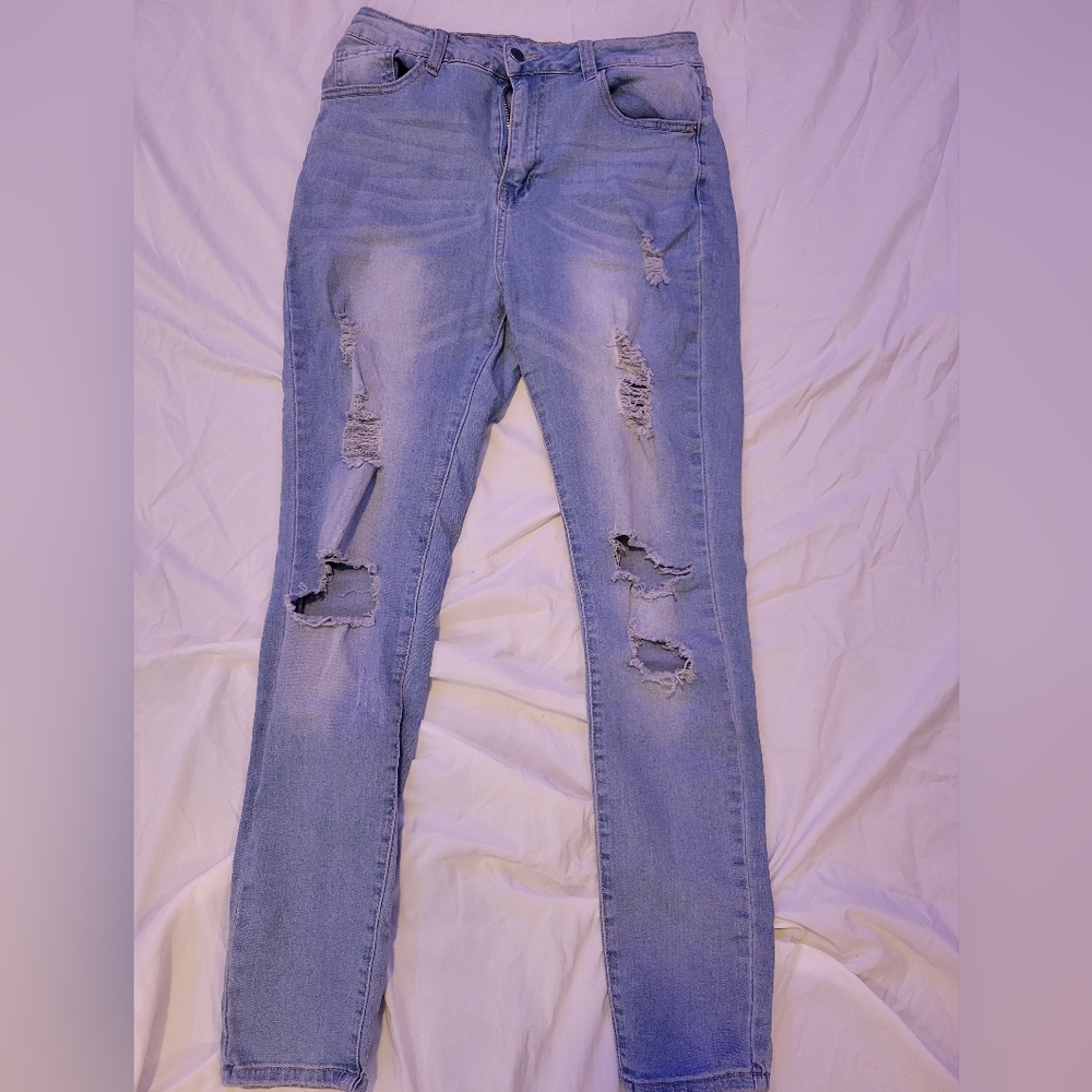 High-waisted ripped blue skinny jeans